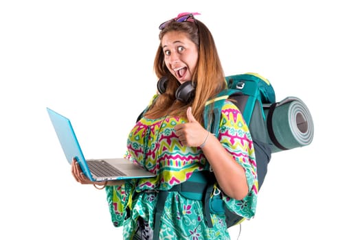 Happy hiker girl with backpack and laptop isolated in white, trekking and travel lifestyle concept