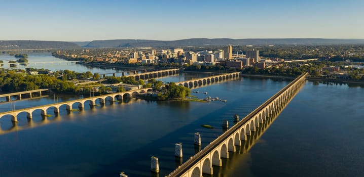 Morning light hits the buildings and bridges downtown city center area in Pennsylvania state capital at Harrisburg
