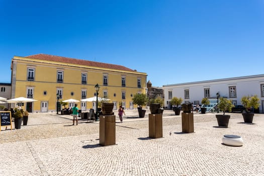Detail of the square inside the Citadel with the official summer residence of the Portuguese president in the backgroung, in Cascais, Portugal
