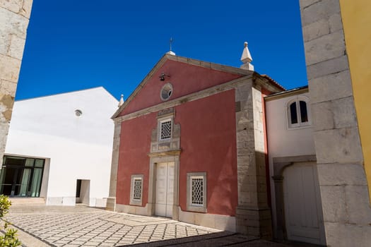 Façade of the Chapel of Our Lady of the Victory, adjacent to the former royal palace, inside the Citadel of Cascais, Portugal