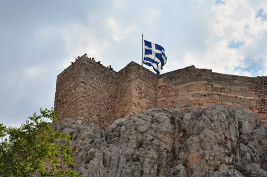 ATHENS, GREECE - SEPTEMBER 8, 2013: People looking at view from the Acropolis.
