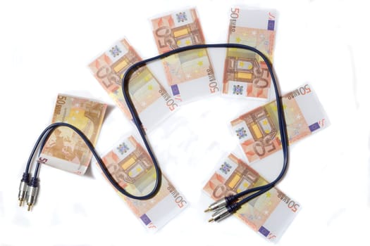 Audiophile concept. Stereo audio cable on banknotes.
