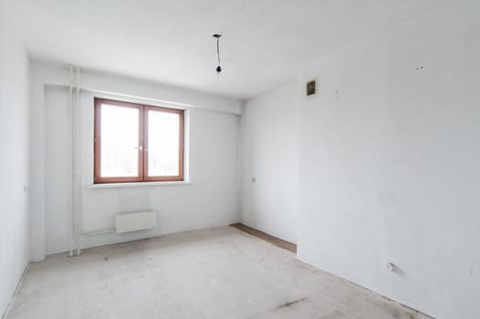 Russia, Moscow- May 21, 2019: interior room apartment. standard repair decoration. rough repair for self-finishing. finishing stage of construction