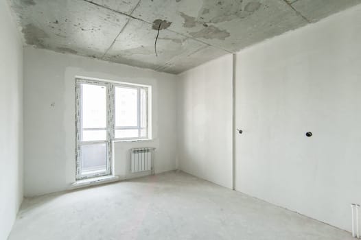 Russia, Moscow- May 21, 2019: interior room apartment. standard repair decoration. rough repair for self-finishing. finishing stage of construction