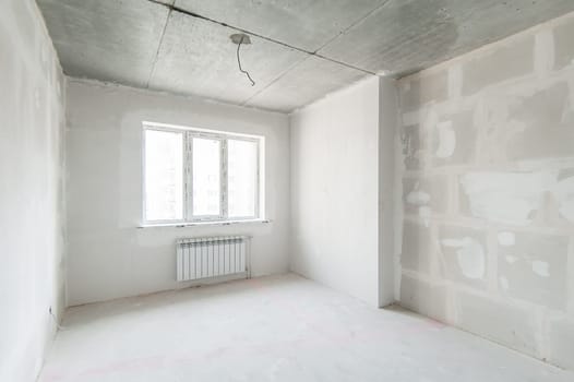Russia, Moscow- May 21, 2019: interior room apartment. standard repair decoration. rough repair for self-finishing. finishing stage of construction