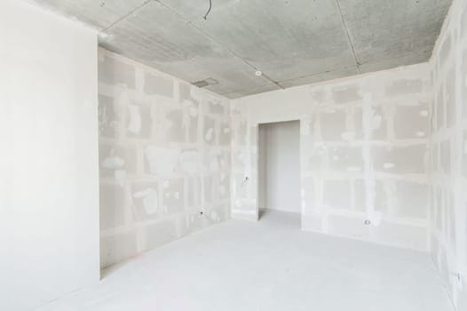 Russia, Moscow- May 21, 2019: interior room apartment. standard repair decoration. rough repair for self-finishing. finishing stage of construction