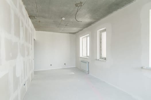 Russia, Moscow- May 21, 2019: interior room apartment. standard repair decoration. rough repair for self-finishing. finishing stage of construction
