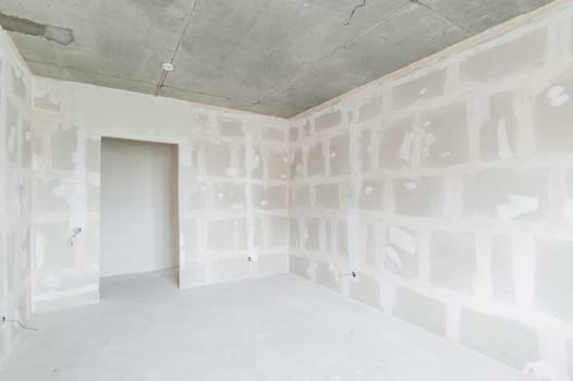 Russia, Moscow- May 21, 2019: interior room apartment. standard repair decoration. rough repair for self-finishing. finishing stage of construction