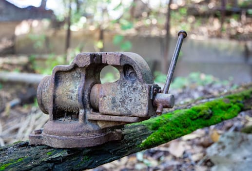 Old handmade rusty vice. Close up
