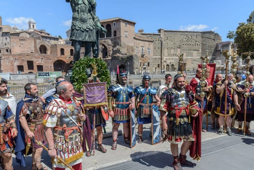 Rome, Italy - April 23, 2017:  the representation of the ancient romans in the Birthday of Rome, with centurions, soldiers, legions, senators, handmaidens, and virgins in Fori Imperiali street, Rome, Italy