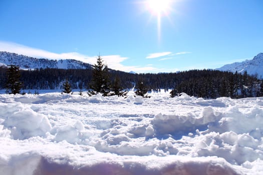 The white snow and the sun in the Italian Alps