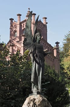 sculpture of the guardian angel at the main cemetery in frankfurt am main germany