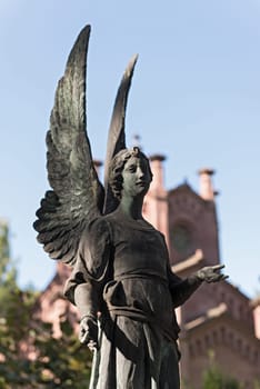 sculpture of the guardian angel at the main cemetery in frankfurt am main germany