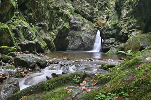 Nyznerov waterfalls or also Silver Creek Falls on the Siver brook in Czech Republic. It is a canyon gorge with rocky thresholds can generate several waterfalls and cascades. Nyznerov, Czech Republic.