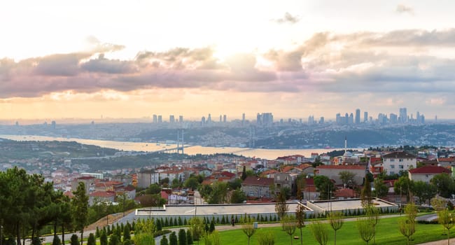 View on the Bosphorus Bridge and Istanbul skyscrappers from Camlica Hill, Turkey.