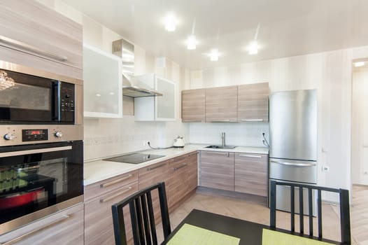 Russia, Moscow- May 29, 2019: interior room apartment. standard repair decoration in hostel. kitchen and dining room