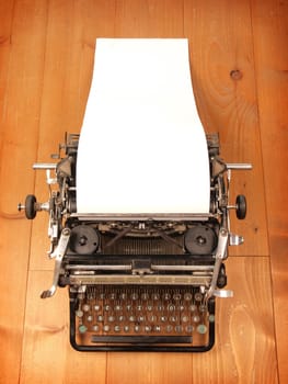 Old vintage typewriter with a blank letter