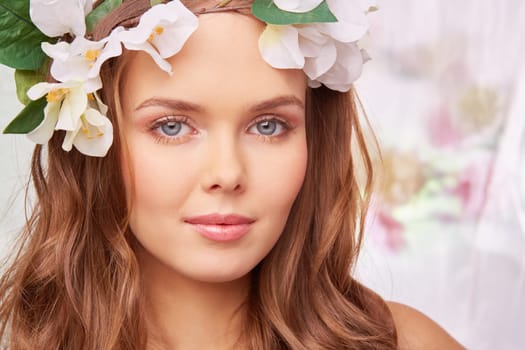 Charming blonde in floral wreath