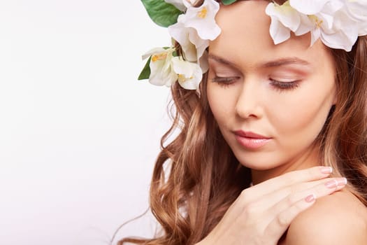 Calm woman in floral wreath