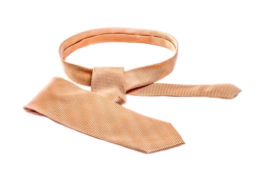 A brightly colored tie on a white background.