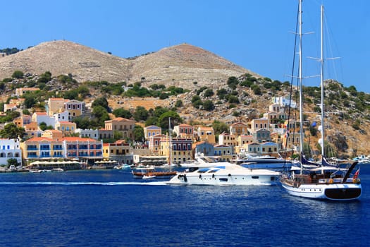 Boats and houses of Simi island in Greece