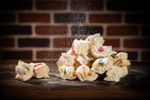 Cakes filled with Turkish delights sprinkled with powdered sugar