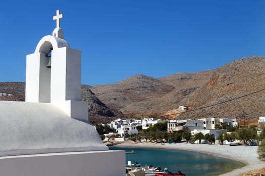 The white church and the bay in Greece