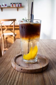 Signature drink of iced peach black coffee, stock photo
