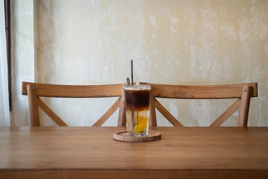 Signature drink of iced peach black coffee, stock photo