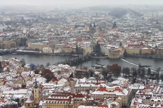 Charles bridge and the snow in Prague in Europe