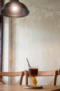 Signature drink of iced peach black coffee, stock photo