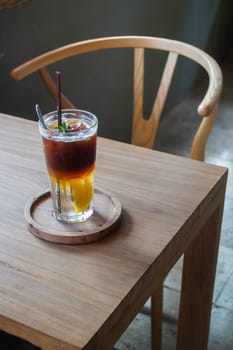 Signature drink of iced peach black coffee, stock photo