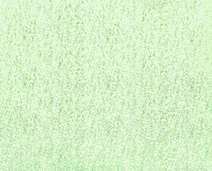 Green glitter foil textured background closeup