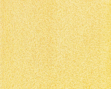 Orange golden glitter foil textured background closeup