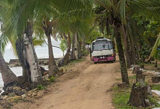 minibus taxi on the coastal piste on the beach of boca del drago panama