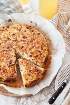 Homemade onion cake with bacon bits and caraway seeds