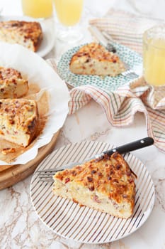 Homemade onion cake with bacon bits and caraway seeds