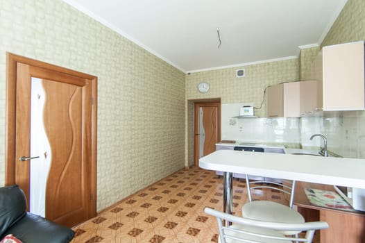 Russia, Moscow- June 05, 2019: interior room apartment. standard repair decoration in hostel. kitchen and dining room