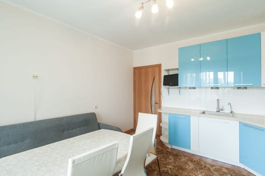 Russia, Moscow- June 05, 2019: interior room apartment. standard repair decoration in hostel. kitchen and dining room