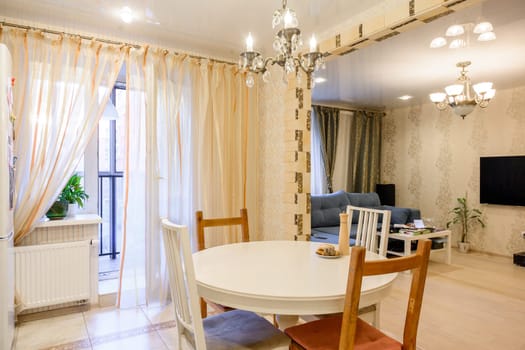Russia, Moscow- June 10, 2019: interior room apartment. standard repair decoration in hostel. kitchen and dining room