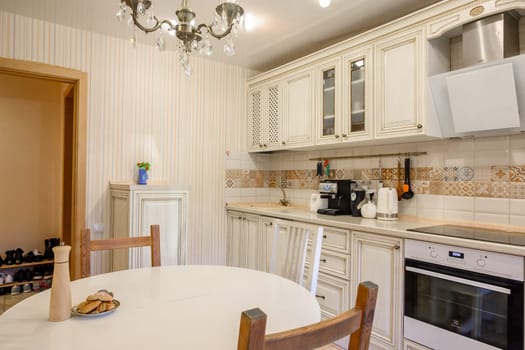 Russia, Moscow- June 10, 2019: interior room apartment. standard repair decoration in hostel. kitchen and dining room