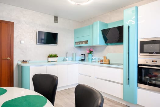 Russia, Moscow- June 10, 2019: interior room apartment. standard repair decoration in hostel. kitchen and dining room