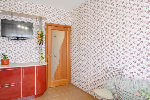 Russia, Moscow- June 10, 2019: interior room apartment. standard repair decoration in hostel. kitchen and dining room