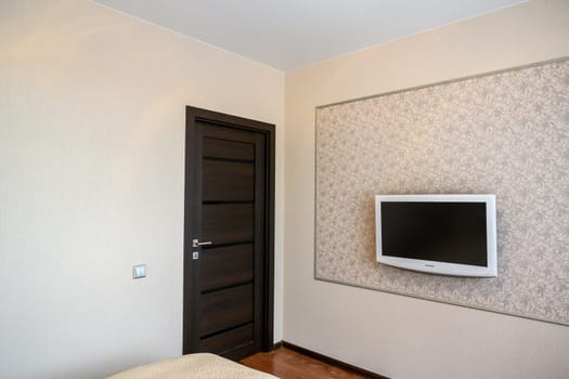 Russia, Moscow- June 10, 2019: interior room apartment. standard repair decoration in hostel. room doors, repair