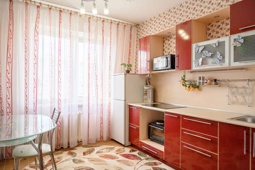 Russia, Moscow- June 10, 2019: interior room apartment. standard repair decoration in hostel. kitchen and dining room
