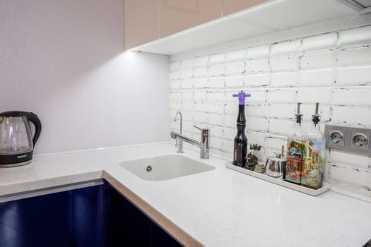 Russia, Moscow- June 10, 2019: interior room apartment. standard repair decoration in hostel. kitchen and dining room