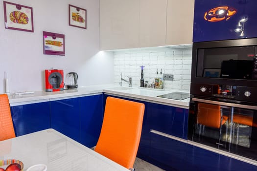 Russia, Moscow- June 10, 2019: interior room apartment. standard repair decoration in hostel. kitchen and dining room