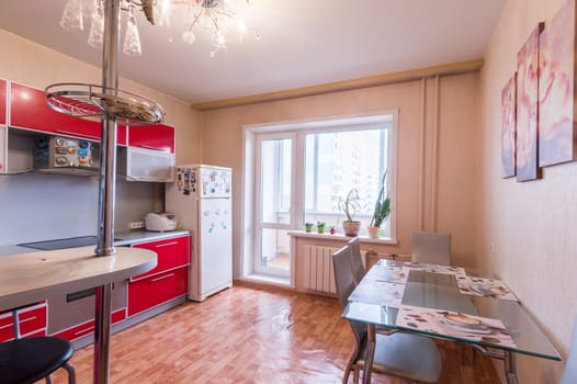 Russia, Moscow- June 10, 2019: interior room apartment. standard repair decoration in hostel. kitchen and dining room