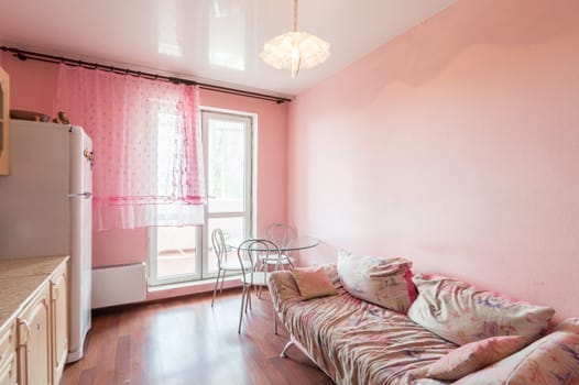 Russia, Moscow- June 10, 2019: interior room apartment. standard repair decoration in hostel. kitchen and dining room