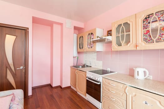 Russia, Moscow- June 10, 2019: interior room apartment. standard repair decoration in hostel. kitchen and dining room
